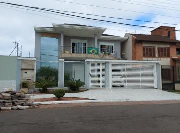 Casa · 318m² · 4 Quartos · 4 Vagas · Sobrado à venda de 4(quatro) dormitórios, sendo 3(três) deles suíte no bairro Bela Vista em Canoas