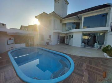 Casa · 311m² · 4 Quartos · 4 Vagas · Sobrado de 4 (quatro) dormitórios sendo os 4 (quatro) suítes, à venda no bairro Moinhos de Vento em