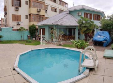 352675_idHWi9C0I1U9VrjQ_352675615c570b68914.jpg · Maravilhoso sobrado de 240m² com 6 dormitórios, pátio com piscina, próximo ao Cassol