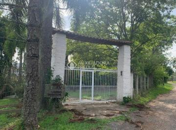 390607_iaF1IA6v3Fcqz3V1z5_390607661003bd75758.jpg · Sítio em Gravataí com 3.180 m² e 2 casas.