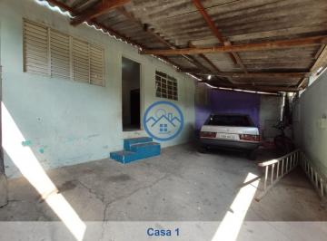 Foto 02 · Três casas em um terreno