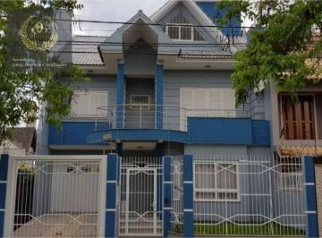 ab88b10fadd9c317004a72053f2362cdf83c6a79 · Casa com 3 dormitórios à venda, 294 m² por R$ 940.000,00 - Sarandi - Porto Alegre/RS