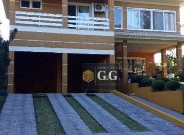 5aeb4517df8c6416143d9b17f53a578fa2153832 · Casa com 5 dormitórios à venda, 350 m² por R$ 1.300.000,00 - Condomínio Condado de Castella - Viamão