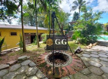 a2b380a6db52fca623f961c62576ddc5353c2fda · Casa com 3 dormitórios à venda, 356 m² por R$ 870.000,00 - Centro - Viamão/RS