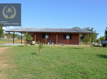 b62490a88d21d3afbcafb404ae7ef5d0fe199f6e · Chácara com 2 dormitórios à venda, 56000 m² por R$ 960.000,00 - Águas Claras - Viamão/RS