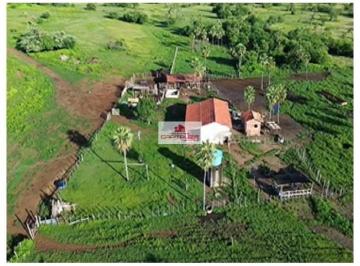 6b460423d5e59bb8f7ba95cbff924466.jpg · Sitio com 10 hectares, casa com 3 quartos, banheiro social, cozinha ampla