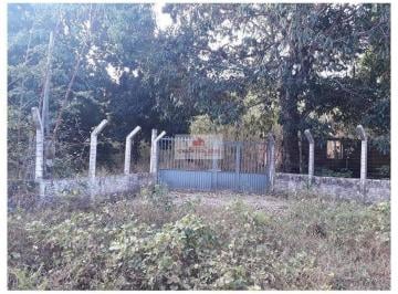 ccb88685ea744cca6b58da462433dffb.jpg · Terreno com 3 hectares, cercado, com portão, e construção inacabada, no portal do parnaíba