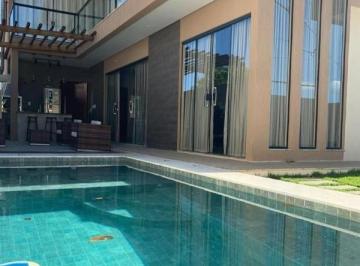 Foto 01 · Excelente casa em condomínio fechado com três suítes a venda em Buraquinho