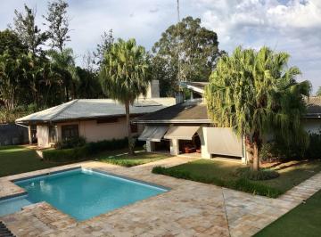 Foto 01 · Casa em condomínio à venda na região do Gramado, com 4 suítes, piscina, salão de festas gourmet e ga