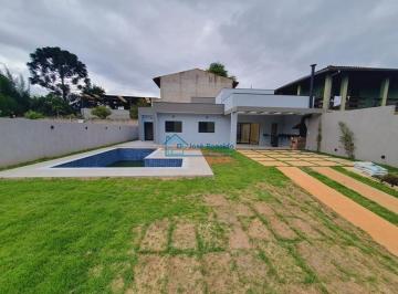 Foto 01 · Casa NOVA moderna com piscina  churrasqueira, aceita financiamento bancário.