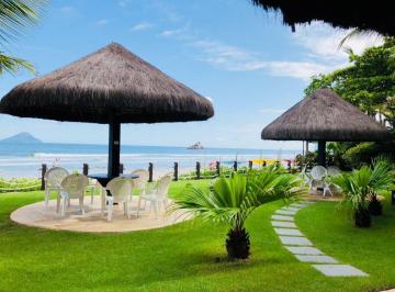 Imagem do Imóvel · Casa em condomínio com área privativa pé na areia.  O imóvel possuí 4 suítes, sendo 1 térrea, sal...