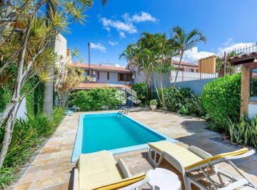 252826_i26R93213u_25282663697ed582fa0.jpg · Casa com 3 dormitórios, 3 suíes, 6 vagas, pátio em Ipanema , Porto Alegre