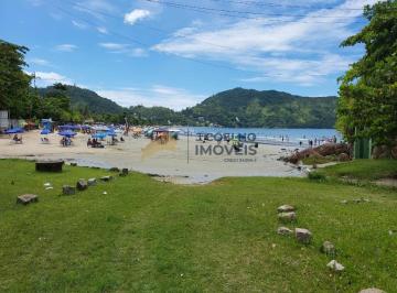 Foto 02 · Casa pé na areia com 5 suítes a venda na Praia da Enseada - Ubatuba/SP