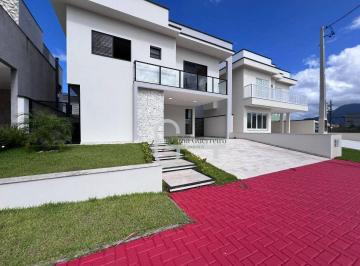 15b8d02be91bfa49410692ccea9b73bcf0bf91ea · Casa com 4 dormitórios à venda, 193 m² por R$ 1.670.000,00 - Condomínio Flora Rica - Peruíbe/SP