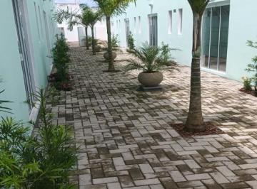 Foto 01 · Sobrado novo com 2 suítes em condomínio fechado a menos de 500 metros da praia