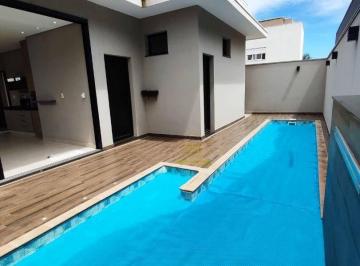 1a54ff9fe87de751eeecf20c5098c12e74993985 · Casa com 3 dormitórios à venda, 200 m² por R$ 2.000.000,00 - Parque Universitário - Condomínio Olivi