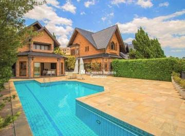 ffe28c6c22755f1120fd4cd8d26b3635957720fc · Casa Imponente em Condomínio de Luxo | 650m², 4 Suítes, R$ 5.950.000