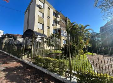 1 · Apartamento central com 2 dormitórios!