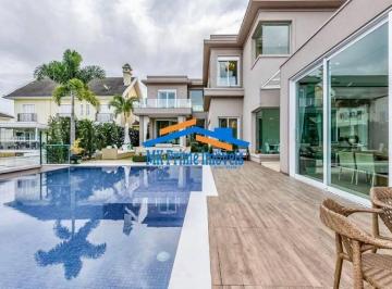 Casa · 740m² · 5 Quartos · 4 Vagas · Linda Casa localizada no condomínio Alphaville residencial 10 com 5 suítes!