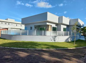 Foto 01 · Casa nova com 4 suítes, piscina e fino acabamento à venda em condomínio de luxo em Peruíbe.