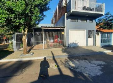 Casa · 210m² · 4 Quartos · 1 Vaga · Amplo Sobrado de 210m² com 4 quartos e Sacada em Sapucaia do Sul