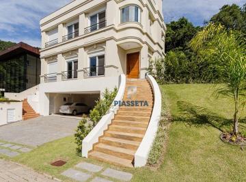 c7354c6a269ba794e7c769f88651e31b401aa5e7 · Casa com 4 dormitórios à venda, condomínio fechado, 319 m² por R$ 5.300.000 - Cacupé - Florianópolis