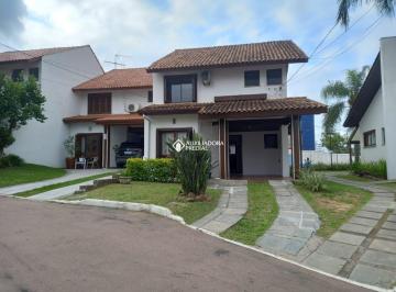 415771_i75632FvIl055iIkr_415771644c1a62d2fb3.jpg · Casa em condomínio com 3 dormitórios no bairro Cavalhada