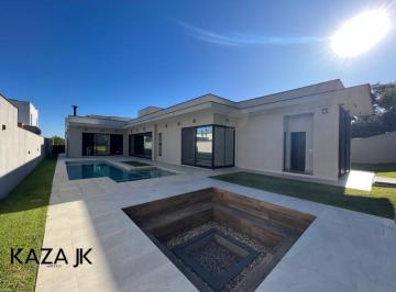 Foto 01 · Casa térrea a venda ou permuta com 4 suítes, gourmet, piscina, 7 vagas no condomínio de alto padrão 
