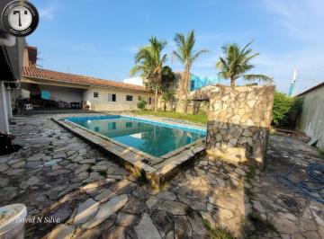 Foto 01 · Casa alto padrão com piscina e área gourmet com churrasqueira a 30 metros do mar.