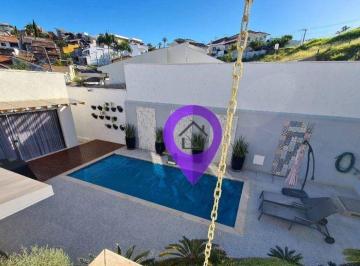 9fbcad112d3544114a830ce14e5b54a70ffb037f · Casa a venda com 5 dormitórios (3 suítes) de 380m² em terreno de 956m². Destaques: área de lazer com