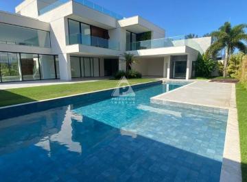 Casa · 1100m² · 5 Quartos · 6 Vagas · Maravilhosa casa contemporânea à venda no Condomínio Malibu, na Barra da Tijuca, com terreno de 1050