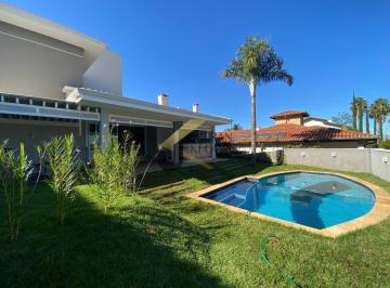 Foto 01 · Casa à venda no Alphaville Campinas com 4 quartos (2 suítes térreas), lazer privativo e garagem para