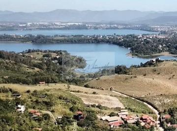 Terreno · 12800m² · Terreno de 12.800 m2, vista para lagoa e próximo ao centrinho da Praia do Rosa