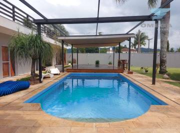 68ecd6bda7bb574a63530d3f33db33ba6f413138 · Casa à Venda no Condomínio Jardim Acapulco no Guarujá | Omega Imóveis