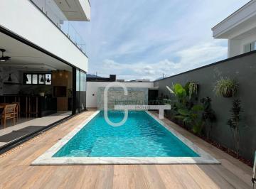 0f7d4e2db060824c42bdd224d61e72618b107ef0 · Casa com 4 dormitórios à venda, 320 m² por R$ 2.500.000,00 - Condomínio Flora Rica - Peruíbe/SP