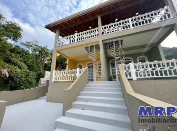Foto 02 · Casa com vista mar à venda na Lagoinha em Ubatuba, em condomínio, oportunidade.