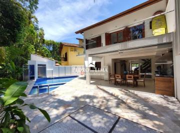 8db526590ae7f566864f5751330b4a2e64dcda20 · Casa com 5 dormitórios à venda, 407 m² por R$ 3.800.000,00 - Riviera Módulo 26 - Bertioga/SP
