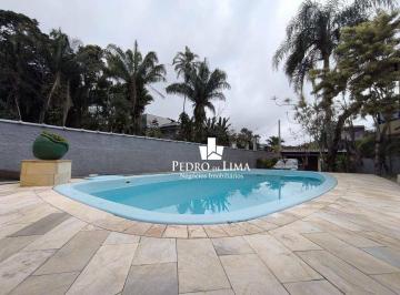 9e36d472817c79950109e5caf0fc557857bdc953 · Casa com 4 dormitórios à venda por R$ 1.980.000,00 - Condomínio Costa do Sol - Bertioga/SP