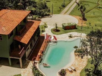 2023/07/94bffa924dca5fb45c8ac8658f249e72.jpg · INCRÍVEL PROPRIEDADE CINEMATOGRÁFICA COM 2 CASAS E PISCINA NATURAL COM PAISAGISMO EM ÁREA DE 65.000