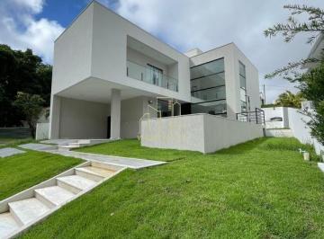 Foto 01 · Com conceito moderno e ambientes amplos essa belíssima casa com quatro suítes a venda em Alphaville 