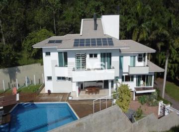 Foto 01 · CASA com 4 dormitórios, 2 garagens, piscina e quadra poliesportiva privativa