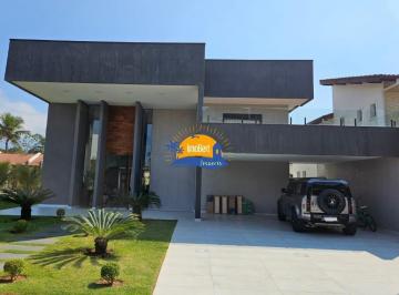 Foto 01 · Casa de condomínio de alto padrão em Bertioga-SP, com 6 quartos, 4 suítes e 517,73 m² de área. Venha