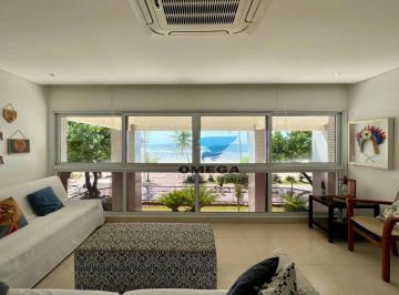 72de9b84acb36ac4eb278b587e79606585ef2cad · Frente ao mar à venda na praia das Astúrias, apartamento com linda vista mar reformado em porcelanat