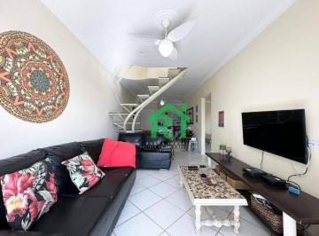 Sala · Cobertura beira mar com 2 quartos (1 suíte), 1 vaga à venda em Pitangueiras, Guarujá.