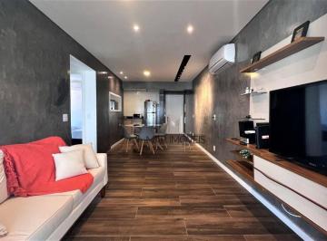 4c3926e87f9b88a4bb6aca2b64ac02a6c26f5ebe · Apartamento à venda no Guarujá, na praia das Astúrias, prédio novo, varanda gourmet, 2 vagas de gar
