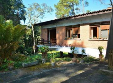 9e3c4037de6e9ae26484489a5e70b59a9ddad82b · Casa na Riviera Paulista - Um Refúgio Natural com Amplo Terreno e Tranquilidade
