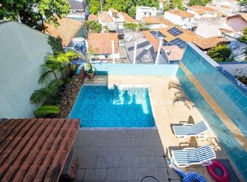 IMOVEIS-NA-VILA-CASA-JARDIM-DA-GLORIA-CHURRASQUEIRA-PISCINA · Ampla e confortável casa com piscina e churrasqueira, localizada em frente à uma praça.