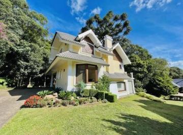 442185_iT2Wa3uV359k_442185650215fdc8c7f.jpg · Belíssima casa 3 suítes em condomínio fechado em Gramado!