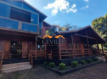 Fachada da casa principal · Sítio 97.000m² com linda casa em Casa Branca