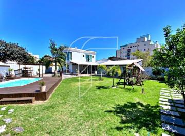 Foto 06 · Luxo e exclusividade na Praia do Morro: casa de praia com 5 quartos, piscina e jardim